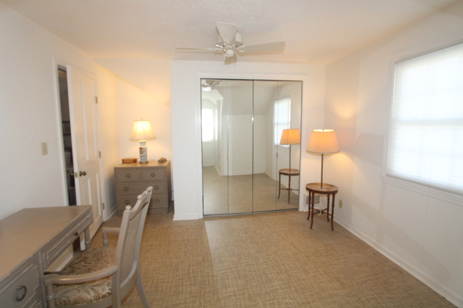 1613 Jones Street Joliet, IL 60435 - Photo 19 of 29 a view of a livingroom with furniture and a window