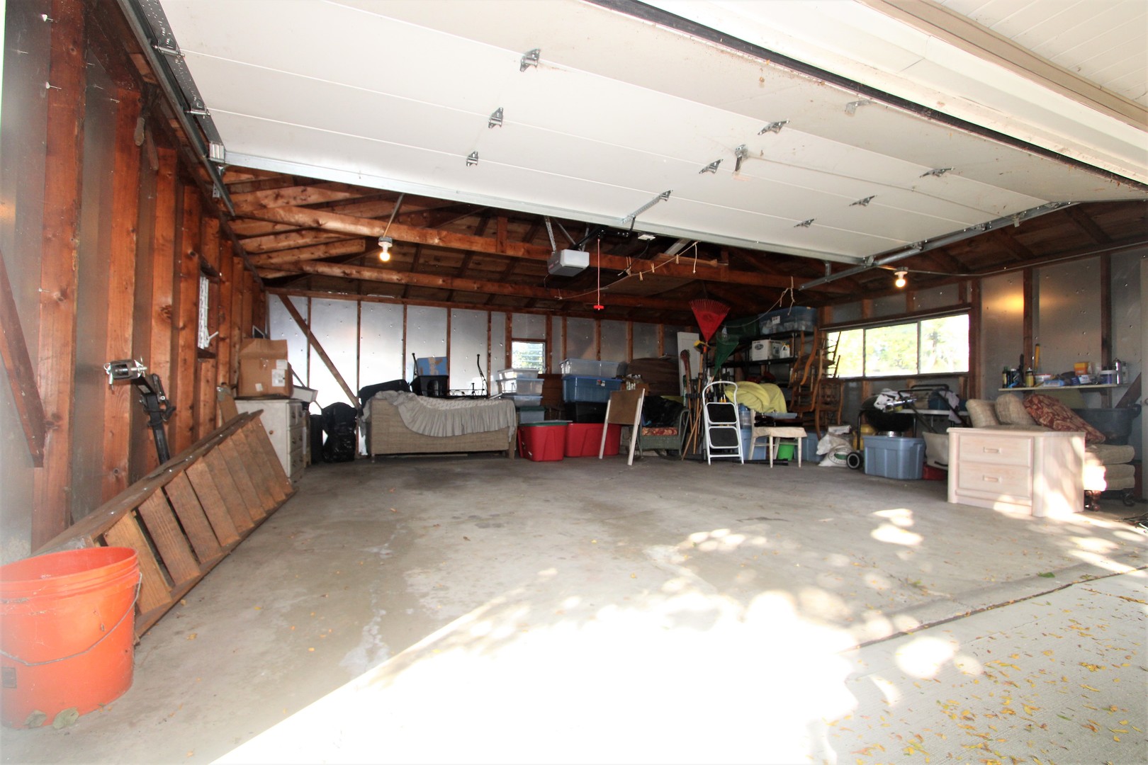 1613 Jones Street Joliet, IL 60435 - Photo 24 of 29 a view of a garage with furniture