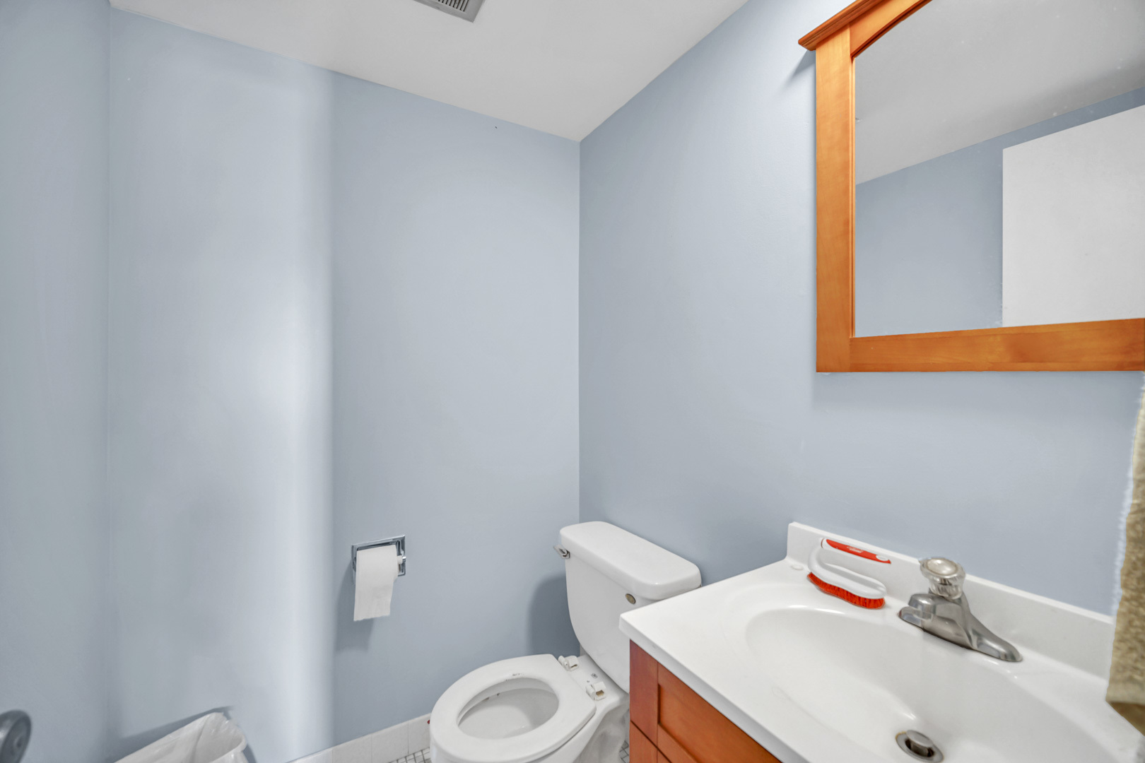 138 East Bailey Road, Unit M Naperville, IL 60565 - Photo 11 of 13 a bathroom with a sink and a toilet