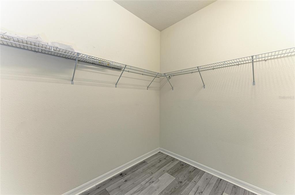 1246 Riverscape Street Bradenton, FL 34208 - Photo 35 of 68 a view of a room with racks on the wall