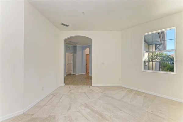 a front view of a building with garden