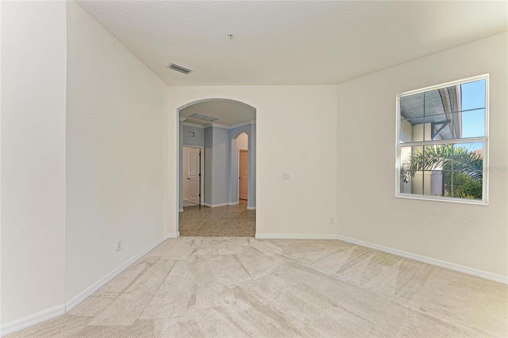 1246 Riverscape Street Bradenton, FL 34208 - Photo 37 of 68 an empty room with windows