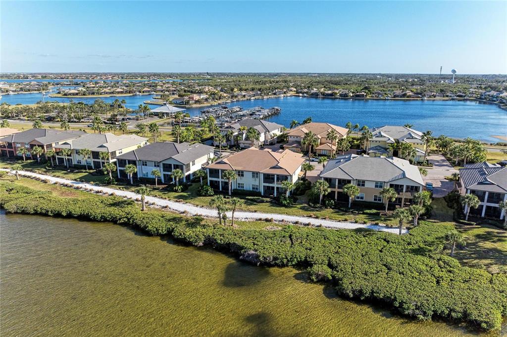 1246 Riverscape Street Bradenton, FL 34208 - Photo 49 of 68 an aerial view of residential houses with outdoor space