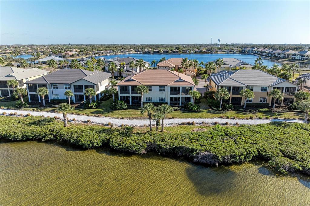1246 Riverscape Street Bradenton, FL 34208 - Photo 50 of 68 a front view of a building with garden