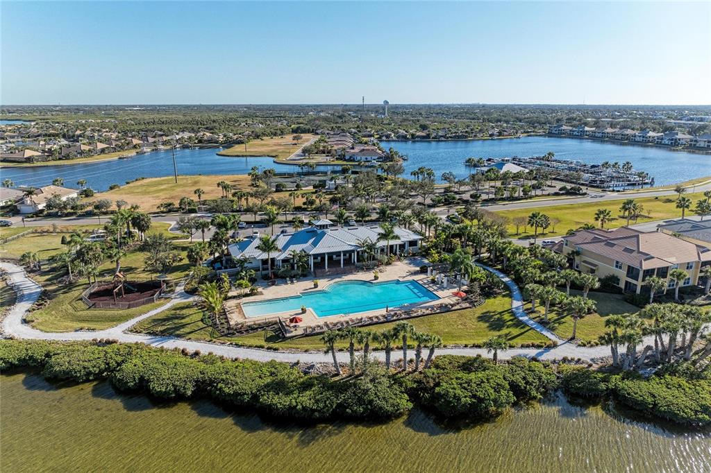 1246 Riverscape Street Bradenton, FL 34208 - Photo 61 of 68 an aerial view of residential houses with outdoor space and river