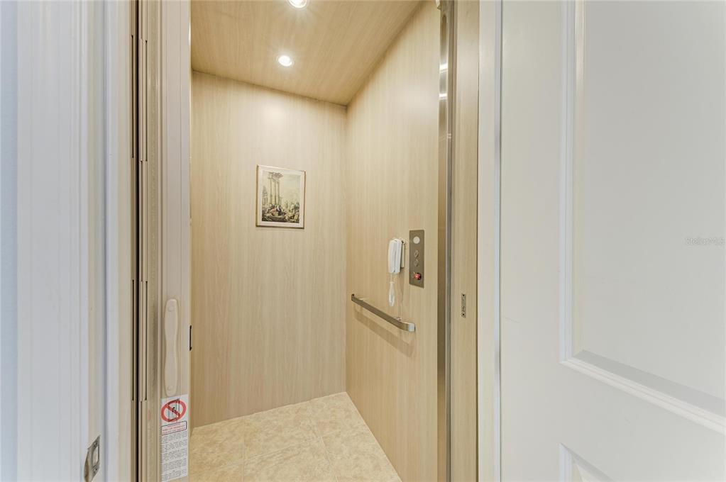 1246 Riverscape Street Bradenton, FL 34208 - Photo 9 of 68 a view of a hallway with two rooms