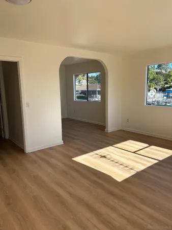 a view of an empty room and window