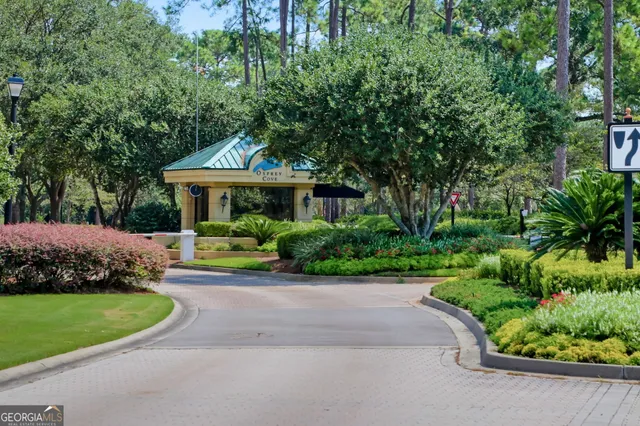 a front view of a house with a yard and porch