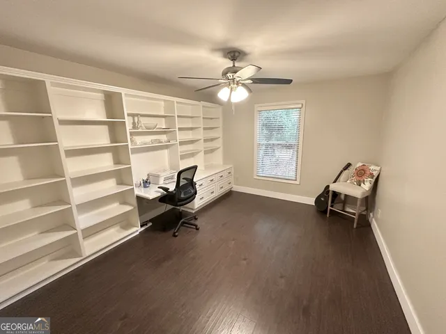 a bedroom with furniture and a chandelier