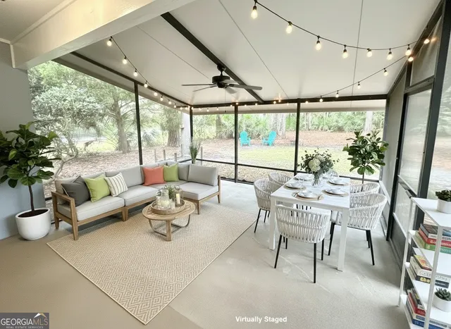 a view of swimming pool with outdoor seating and plants