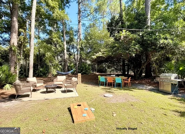 a view of a lake with a yard