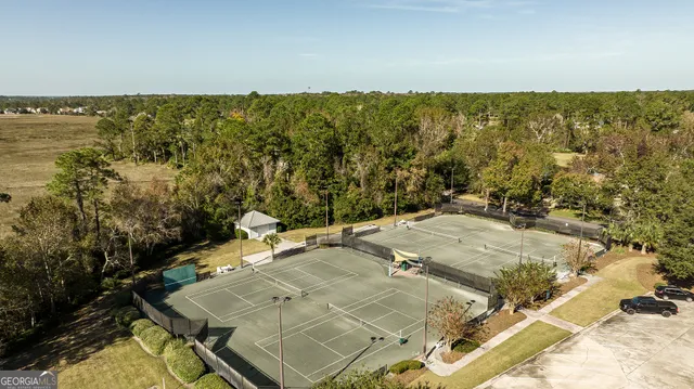 a view of a park that has a sign board