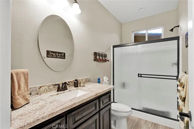 a view of a terrace with a table and chairs