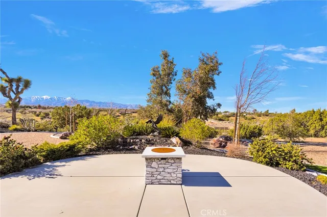 a view of an ocean and a mountain
