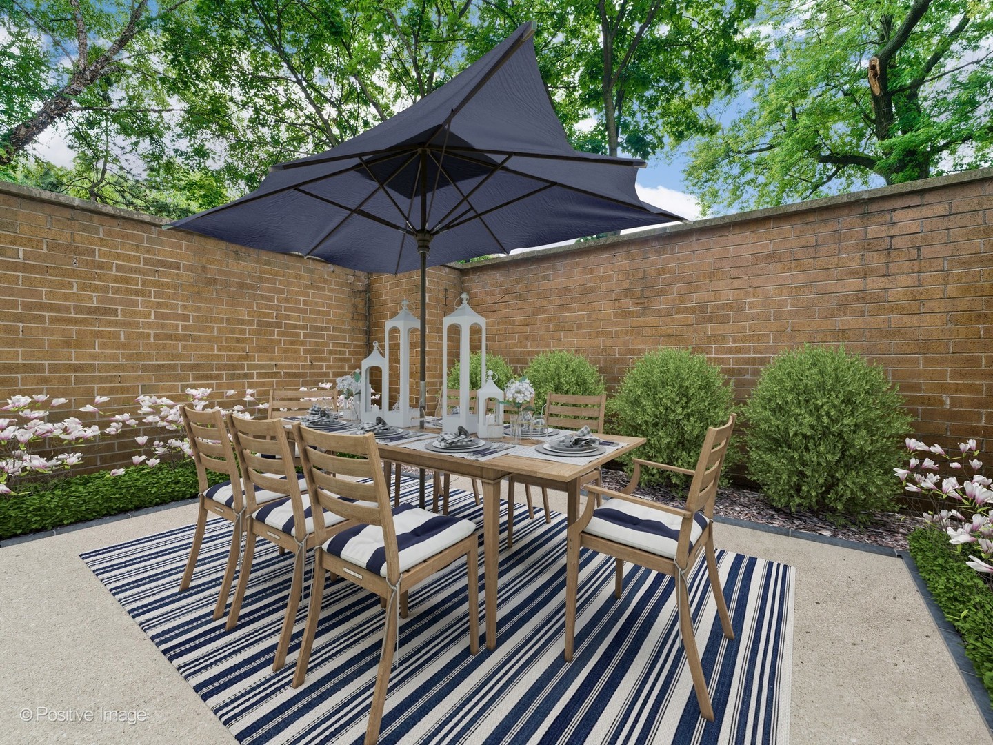 1114 West Altgeld Street, Unit A2 Chicago, IL 60614 - Photo 4 of 19 an outdoor space with furniture and umbrella