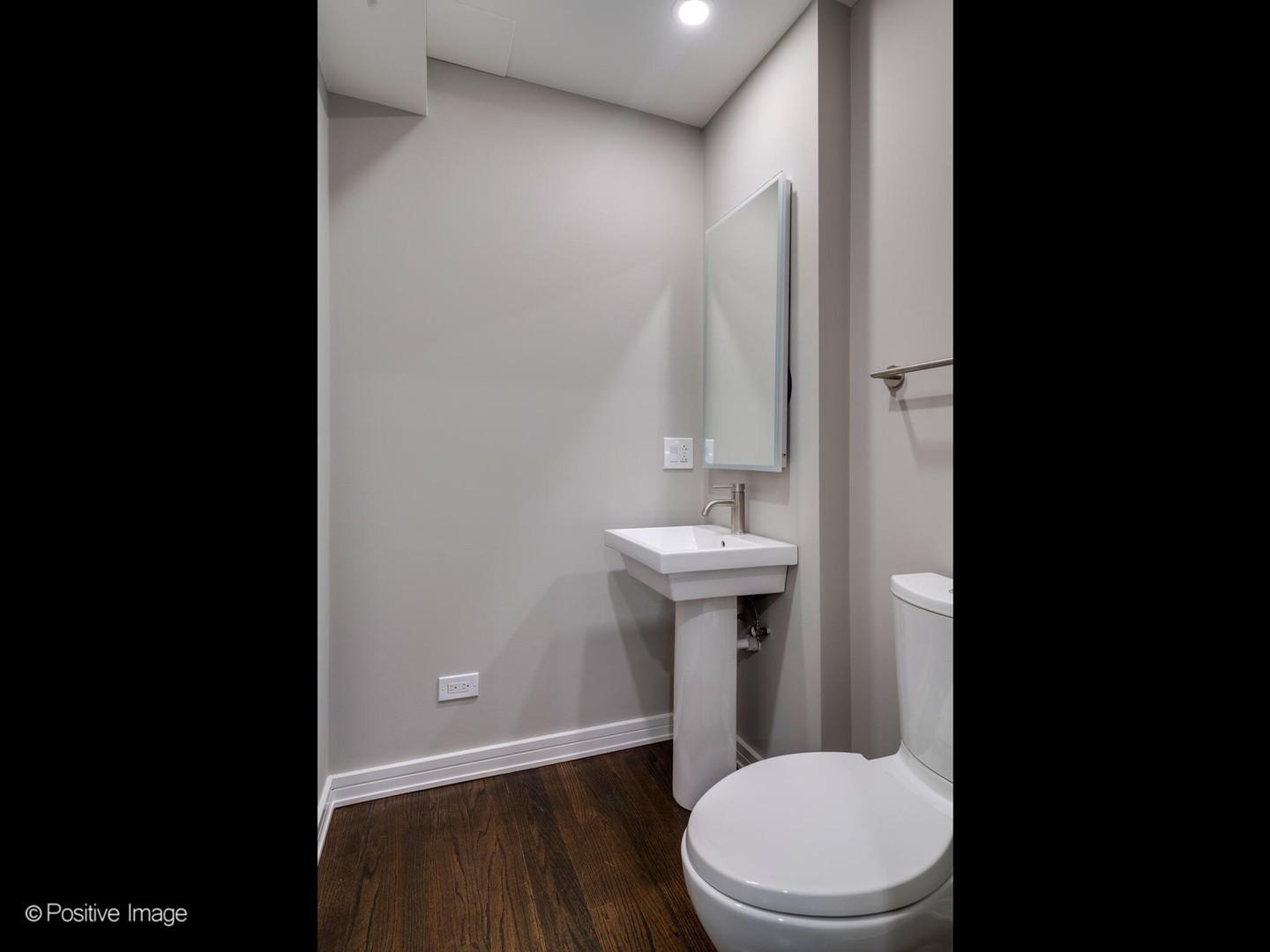 1114 West Altgeld Street, Unit A2 Chicago, IL 60614 - Photo 8 of 19 a bathroom with a sink a toilet and shower