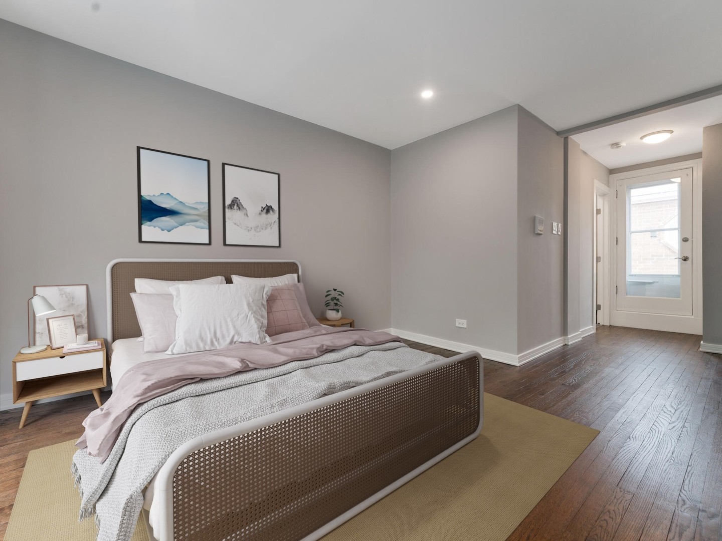 1114 West Altgeld Street, Unit A2 Chicago, IL 60614 - Photo 9 of 19 a bedroom with a bed and painting on the wall