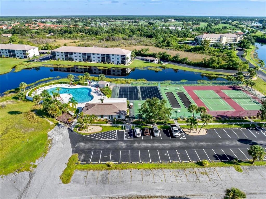 175 Kings Highway, Unit 236 Punta Gorda, FL 33983 - Photo 21 of 26 a view of swimming pool with outdoor seating