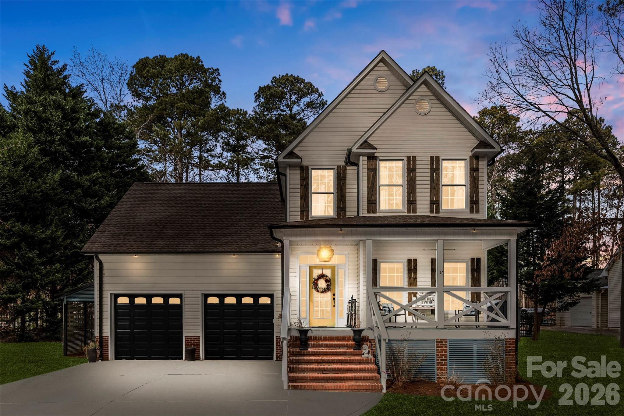 7901 McConnell Road Denver, NC 28037 - Photo 25 of 27 a front view of a house with a yard