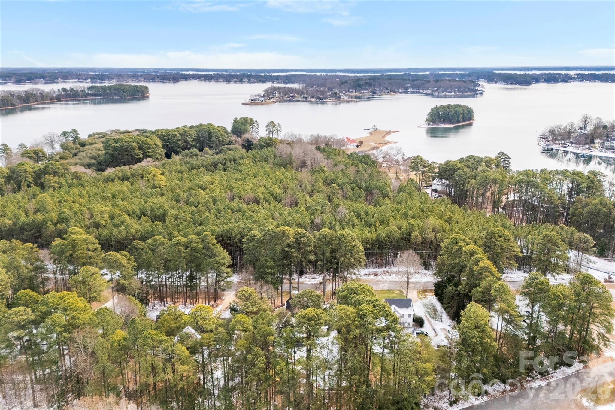 7901 McConnell Road Denver, NC 28037 - Photo 27 of 27 a view of a lake with a city