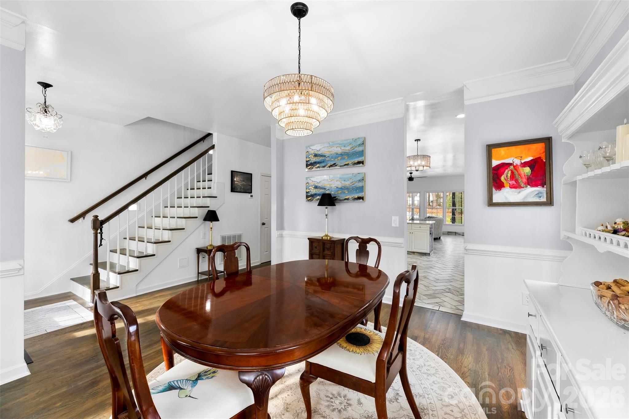 7901 McConnell Road Denver, NC 28037 - Photo 4 of 27 a view of a dining room with furniture and wooden floor