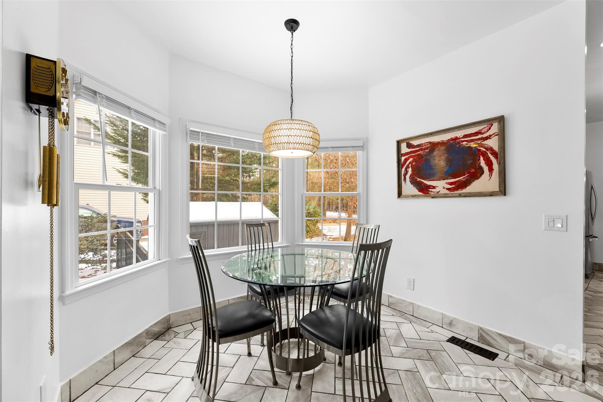7901 McConnell Road Denver, NC 28037 - Photo 6 of 27 a view of a dining room with furniture window and outside view