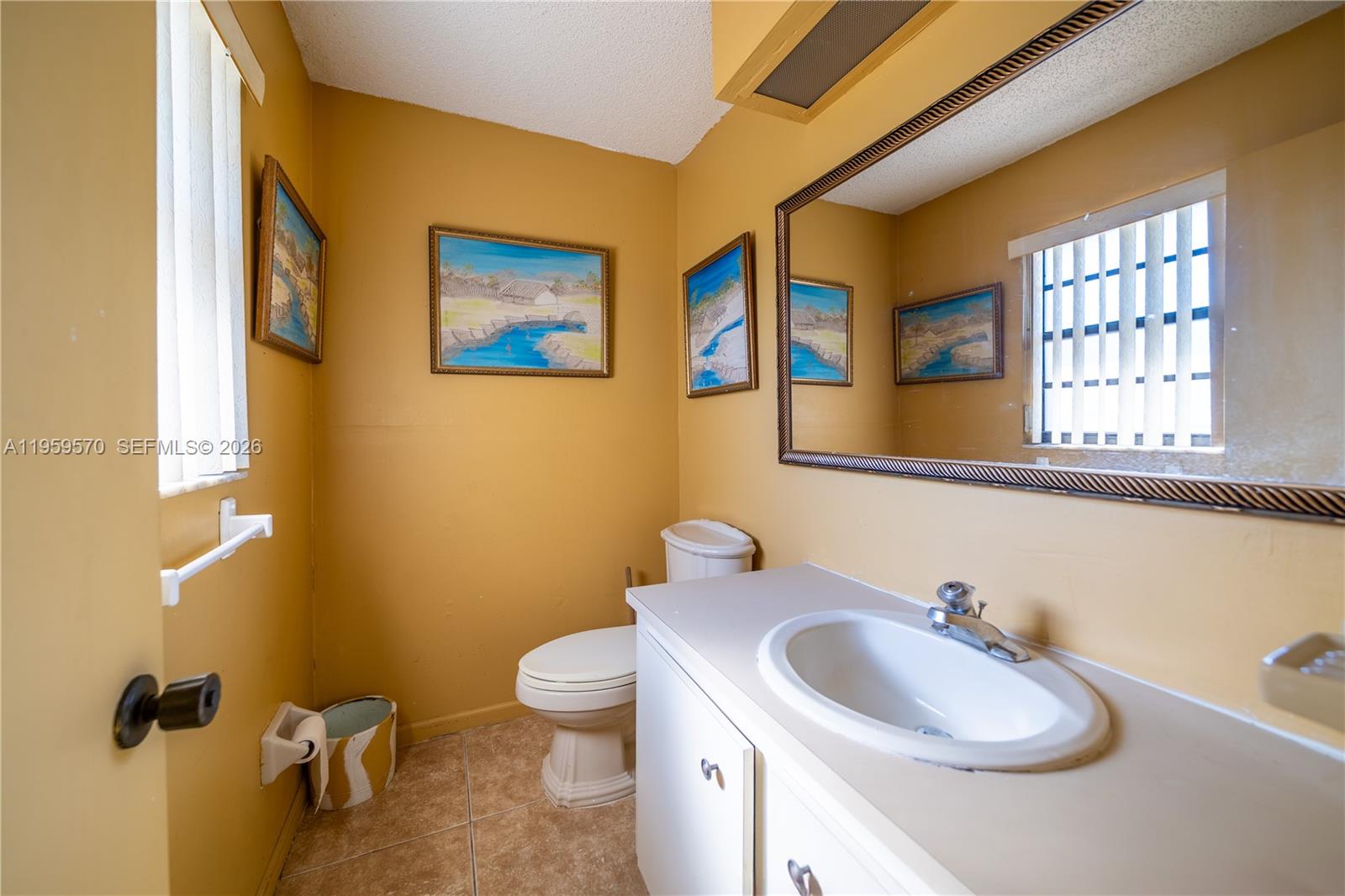 6337 Southwest 32nd Street Miramar, FL 33023 - Photo 23 of 51 1/2 Bath in guest bedroom