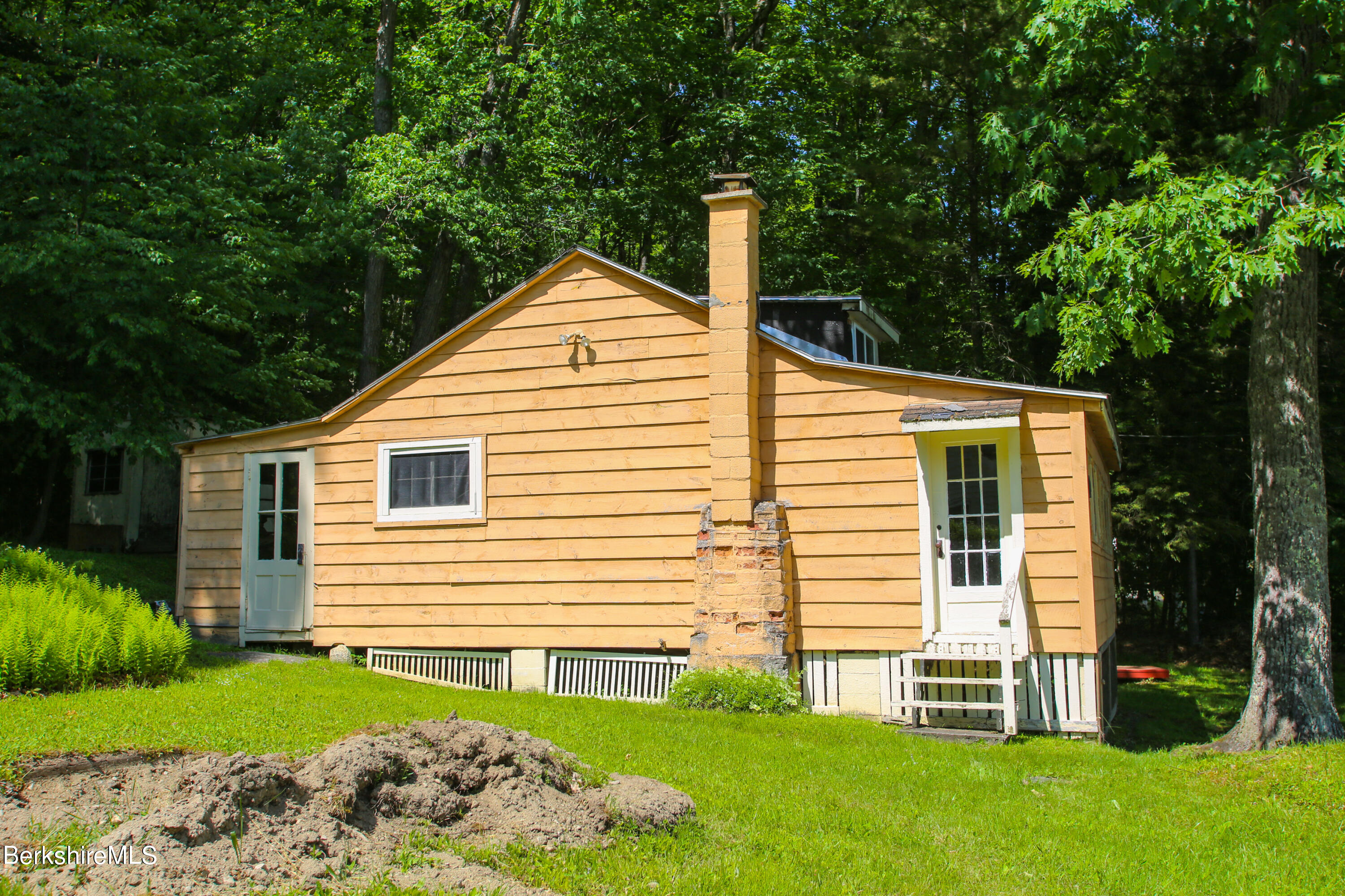50 Pond Road Rowe, MA 01367 - Photo 3 of 17 a view of a house with a yard