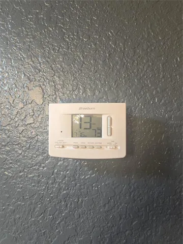 a view of a house with a yard and plants