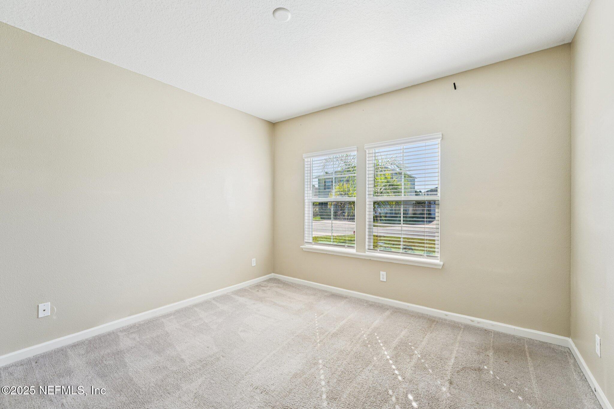 428 Lake Sinclair Street St. Augustine, FL 32084 - Photo 23 of 72 an empty room with a window
