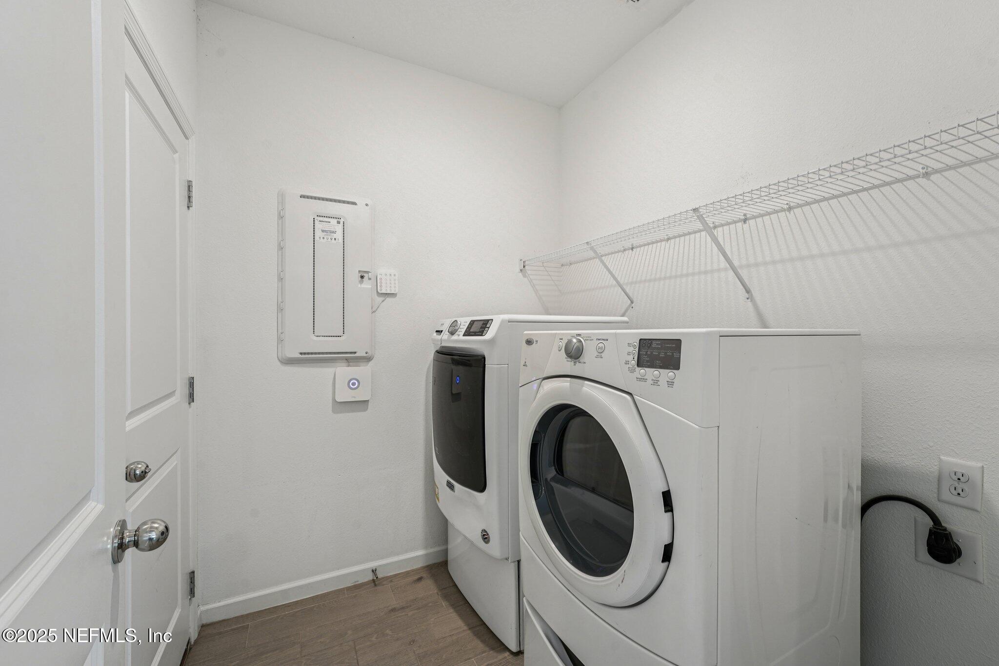 428 Lake Sinclair Street St. Augustine, FL 32084 - Photo 24 of 72 a utility room with dryer and washer