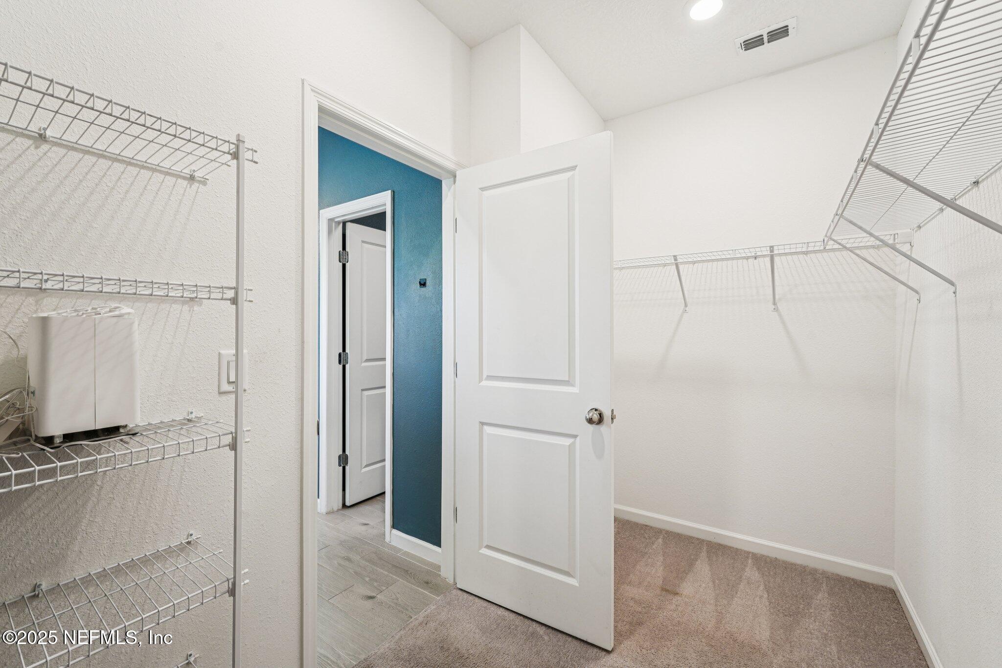 428 Lake Sinclair Street St. Augustine, FL 32084 - Photo 32 of 72 a view of a bathroom with a shower