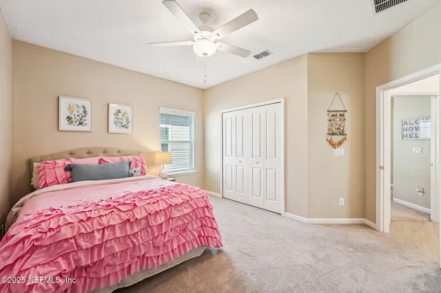 a view of a swimming pool and an outdoor seating