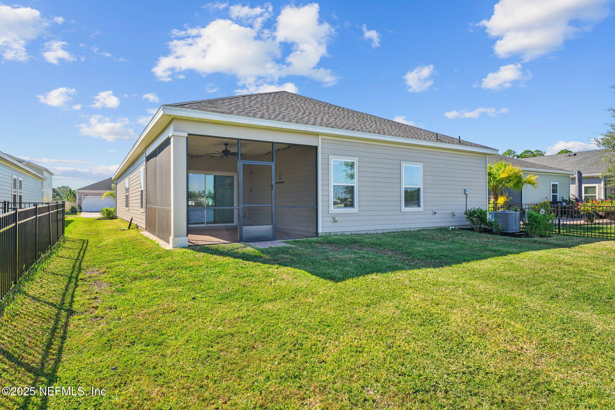428 Lake Sinclair Street St. Augustine, FL 32084 - Photo 44 of 72 a view of a house with backyard and porch