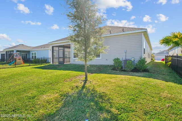 a view of a yard with an outdoor space