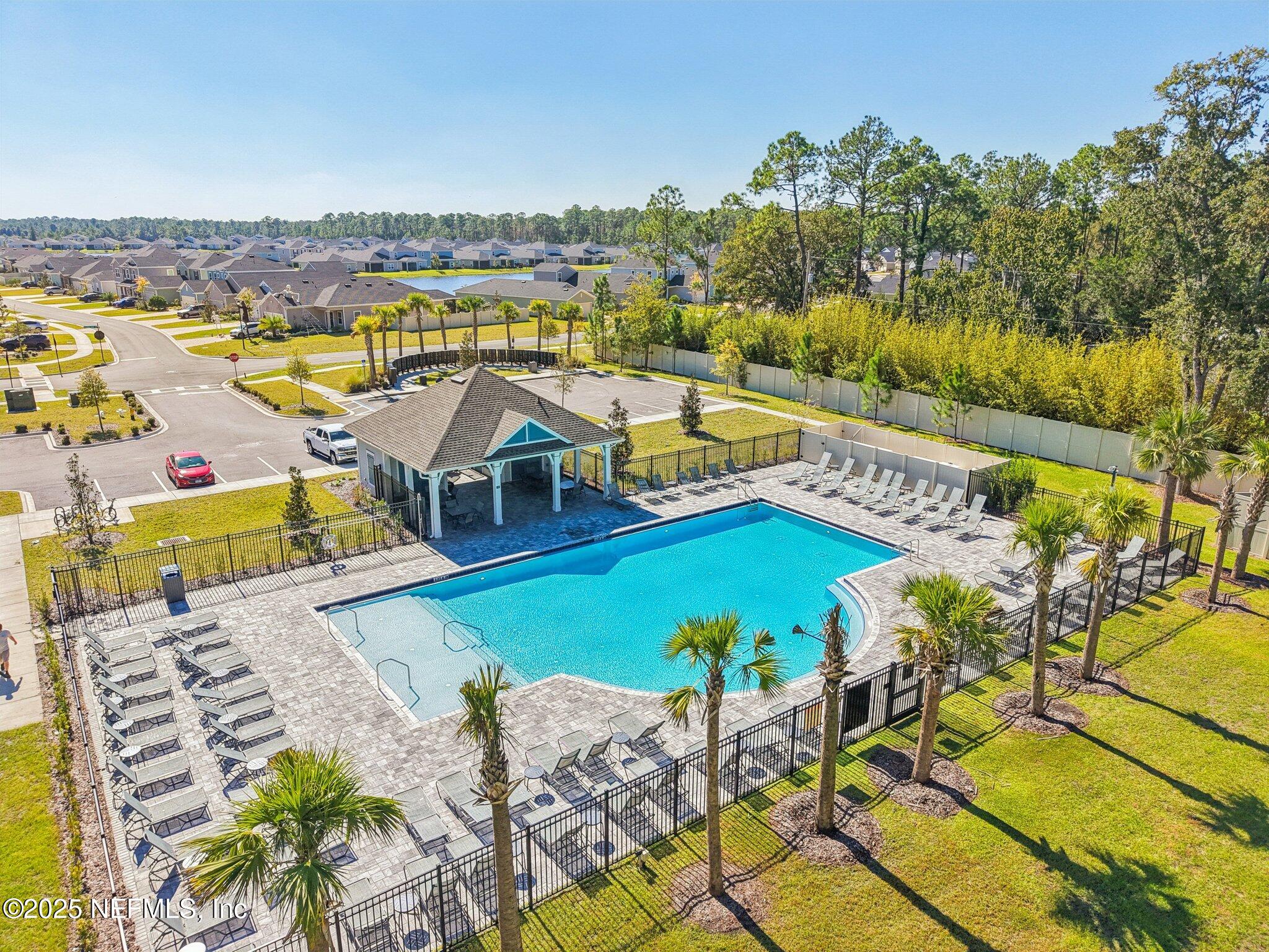 428 Lake Sinclair Street St. Augustine, FL 32084 - Photo 71 of 72 an aerial view of a house with a swimming pool