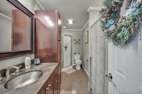 a bathroom with a sink and mirror