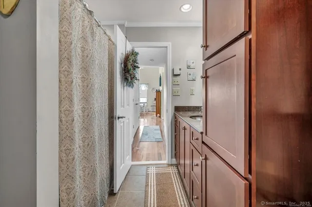 a view of a kitchen from the hallway