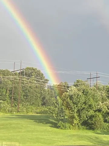 a view of a swimming pool with an ocean view