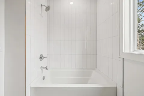 a close up of a bathtub curtain