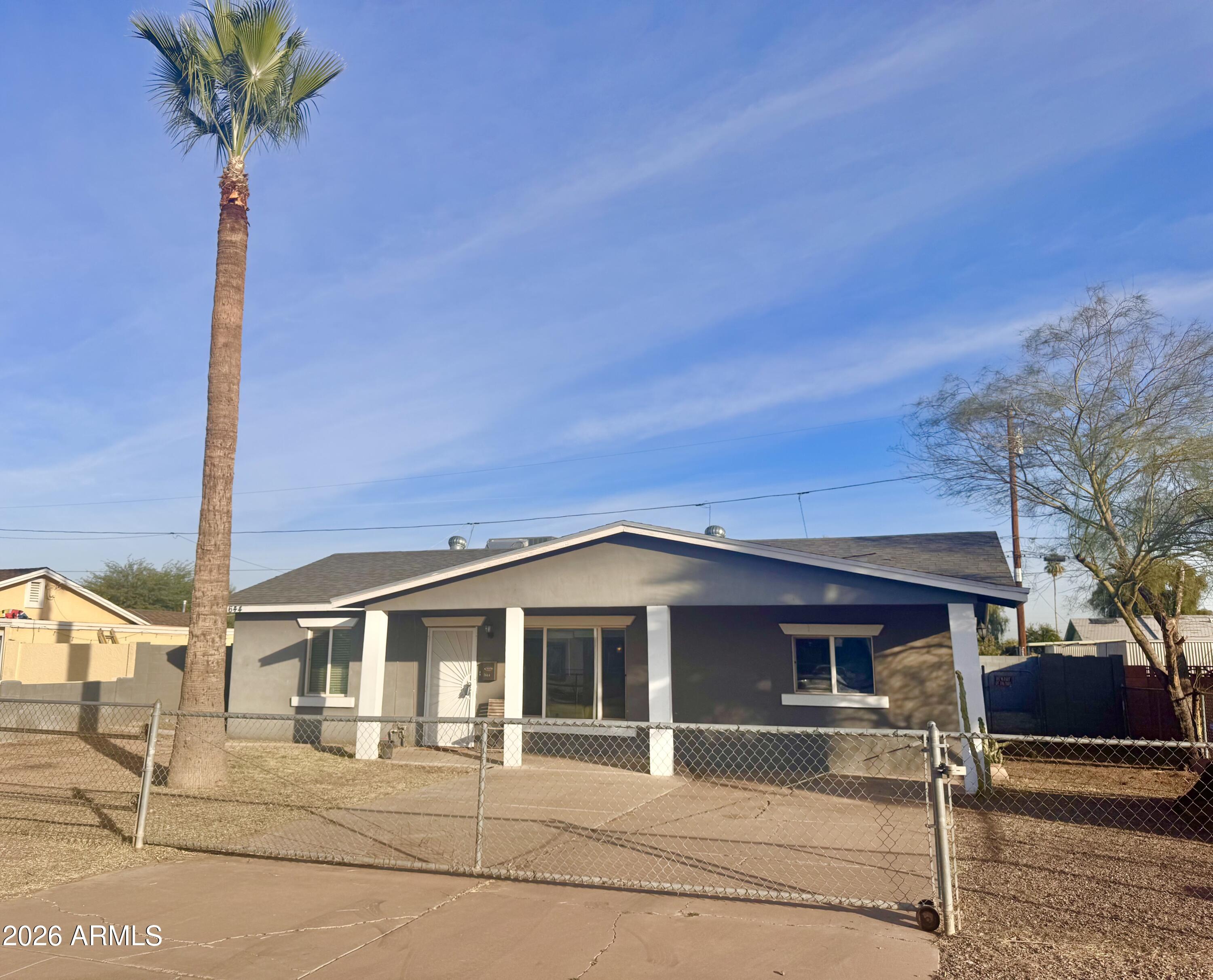 1644 West Sonora Street Phoenix, AZ 85007 - Photo 1 of 29 a front view of a house with a porch
