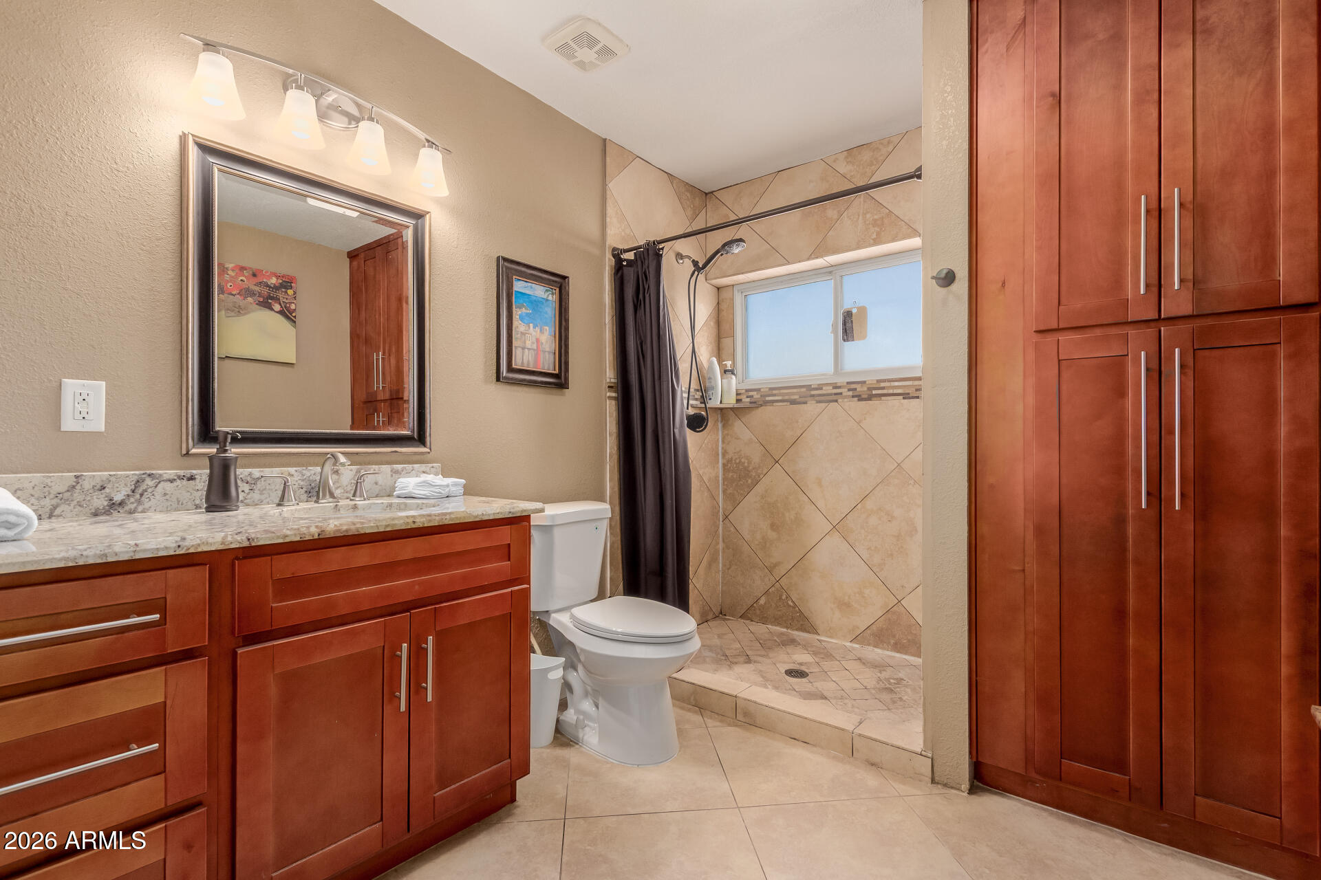 1644 West Sonora Street Phoenix, AZ 85007 - Photo 17 of 29 a bathroom with a granite countertop sink toilet and shower