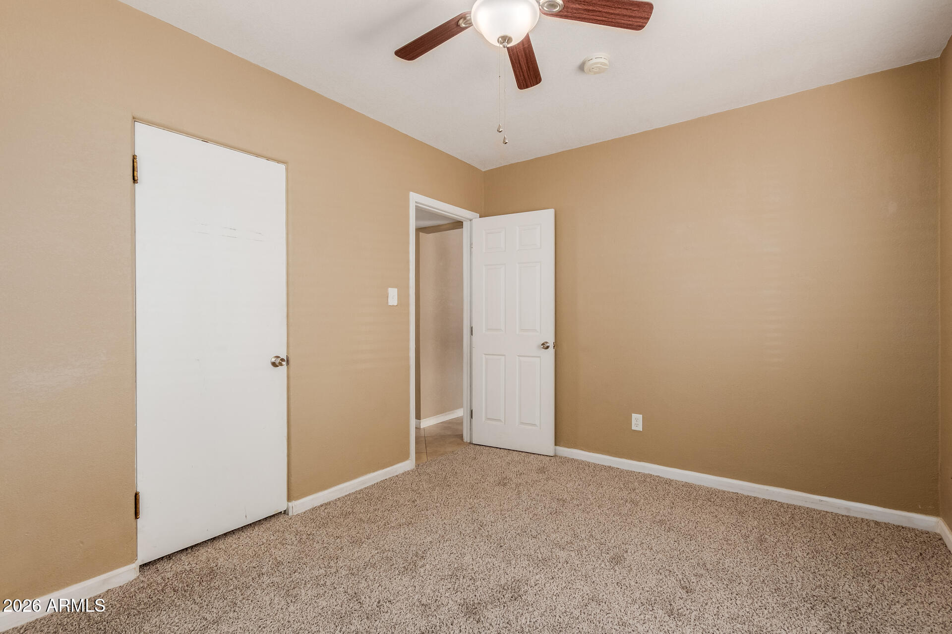 1644 West Sonora Street Phoenix, AZ 85007 - Photo 20 of 29 an empty room with ceiling fan