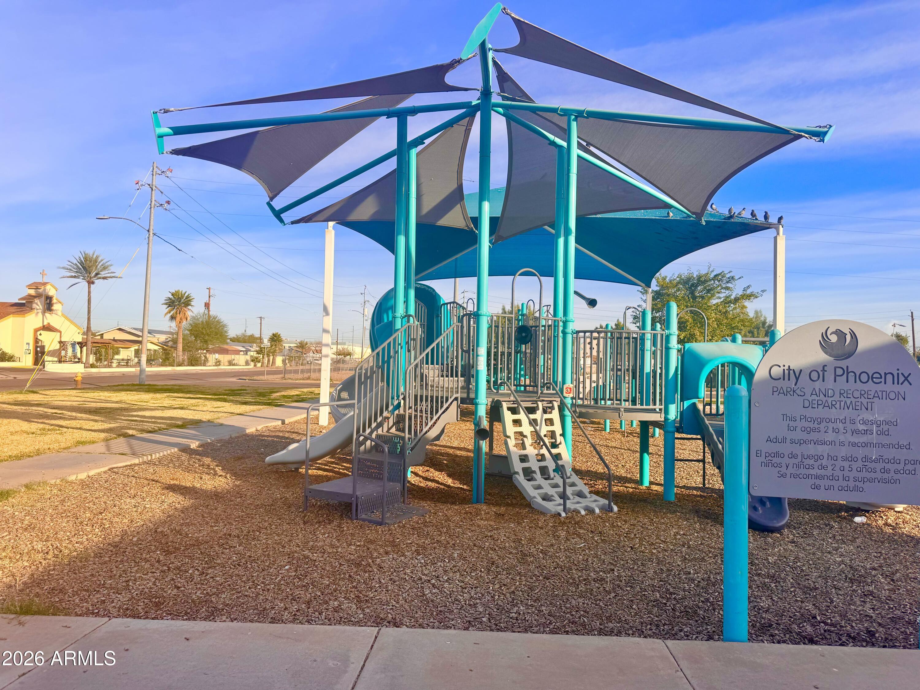 1644 West Sonora Street Phoenix, AZ 85007 - Photo 28 of 29 a view of a patio with a table and chairs