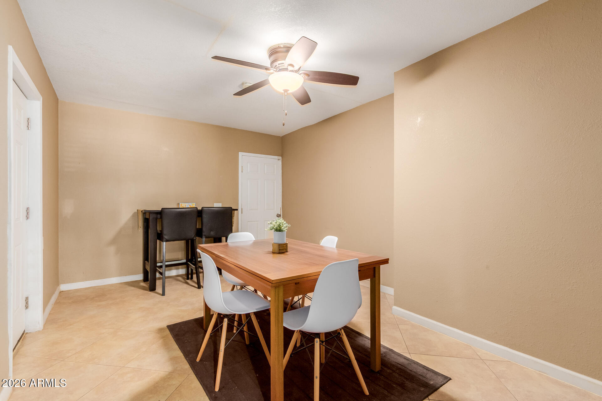 1644 West Sonora Street Phoenix, AZ 85007 - Photo 6 of 29 a view of a dining room with furniture and wooden floor