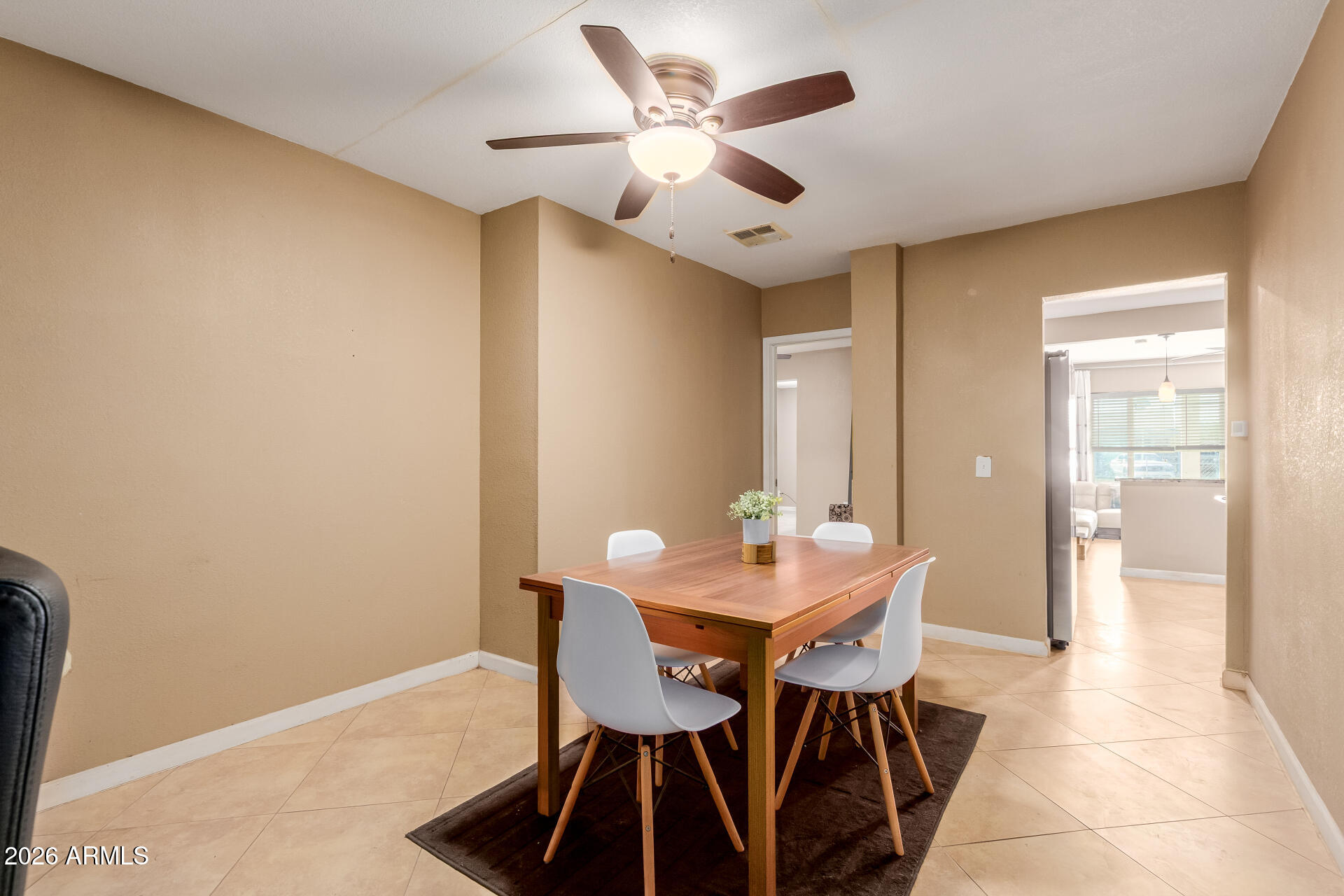 1644 West Sonora Street Phoenix, AZ 85007 - Photo 7 of 29 a view of a dining room with furniture and wooden floor