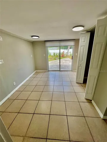 a view of an empty room and window