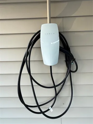 a view of staircase with a glass door and a window