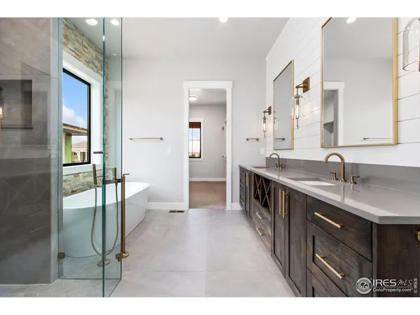 a kitchen with sink and refrigerator