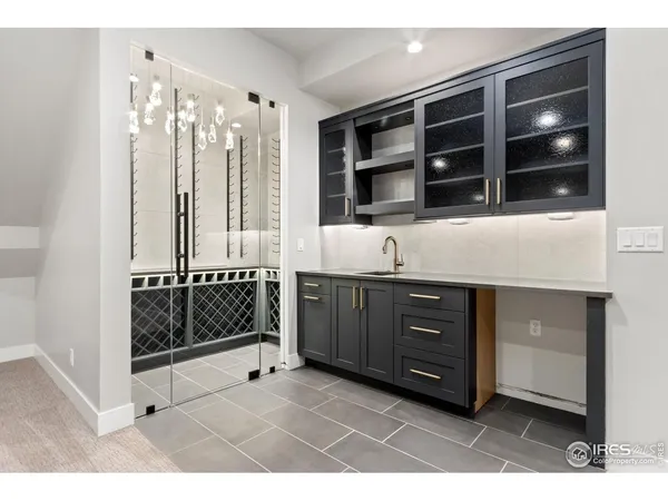 a bathroom with a sink a vanity and shower